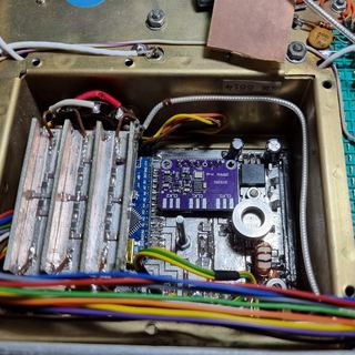The VFO board mounted in a shielded compartment inside the radio