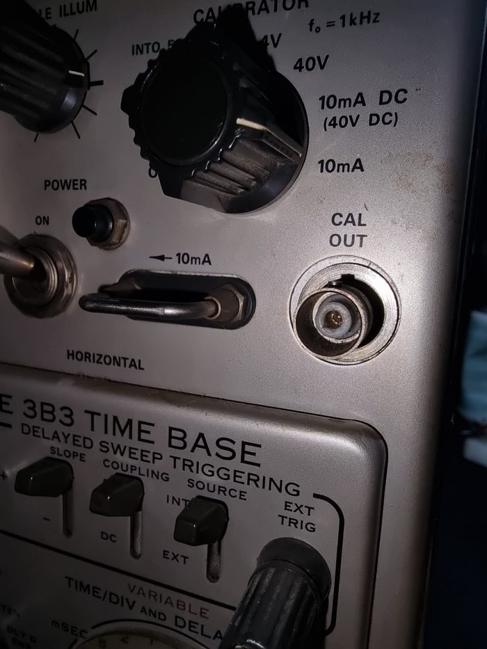 The CAL OUT BNC connector on the 564B front panel before the repair, with its centre pin damaged