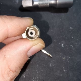 Removing the old centre pin from the connector