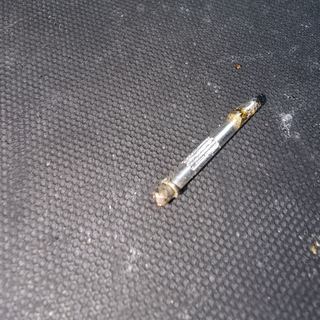 The old centre pin with its broken contact points