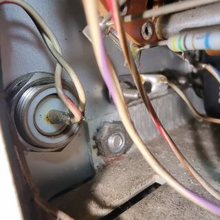 The replacement pin taken from a donor connector